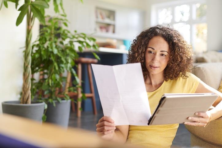 A woman reading some document