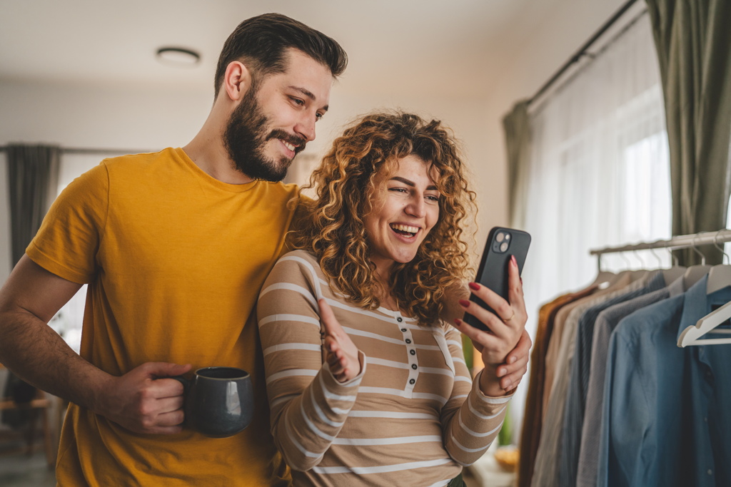 couple taking a look at their phone