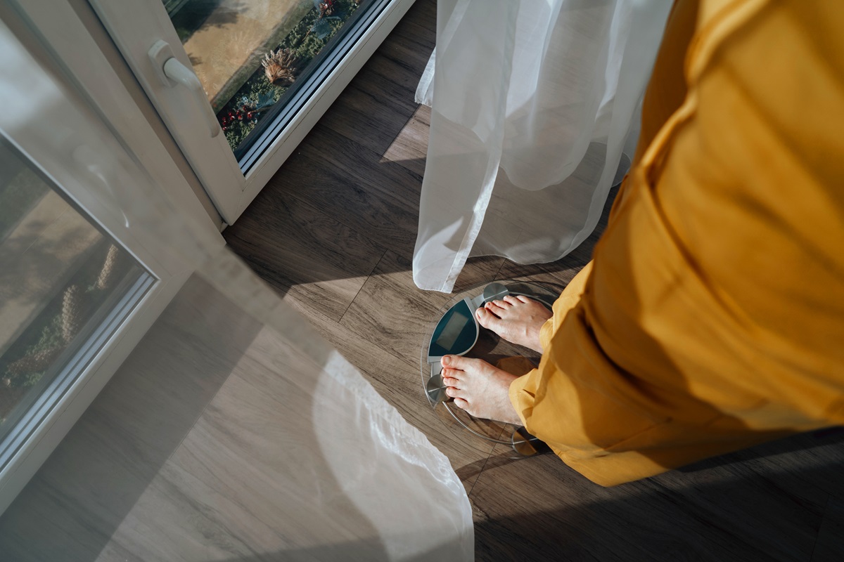 a _lady_checking_weight