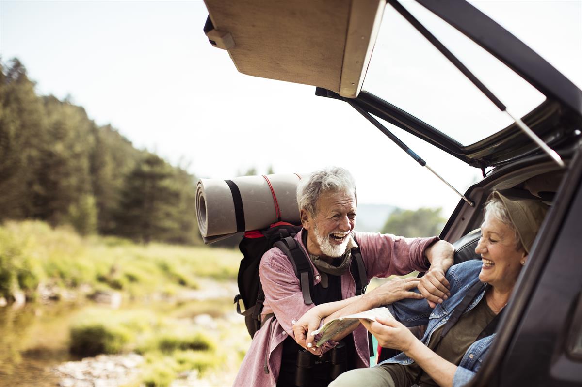 An elderly couple enjoying trekking