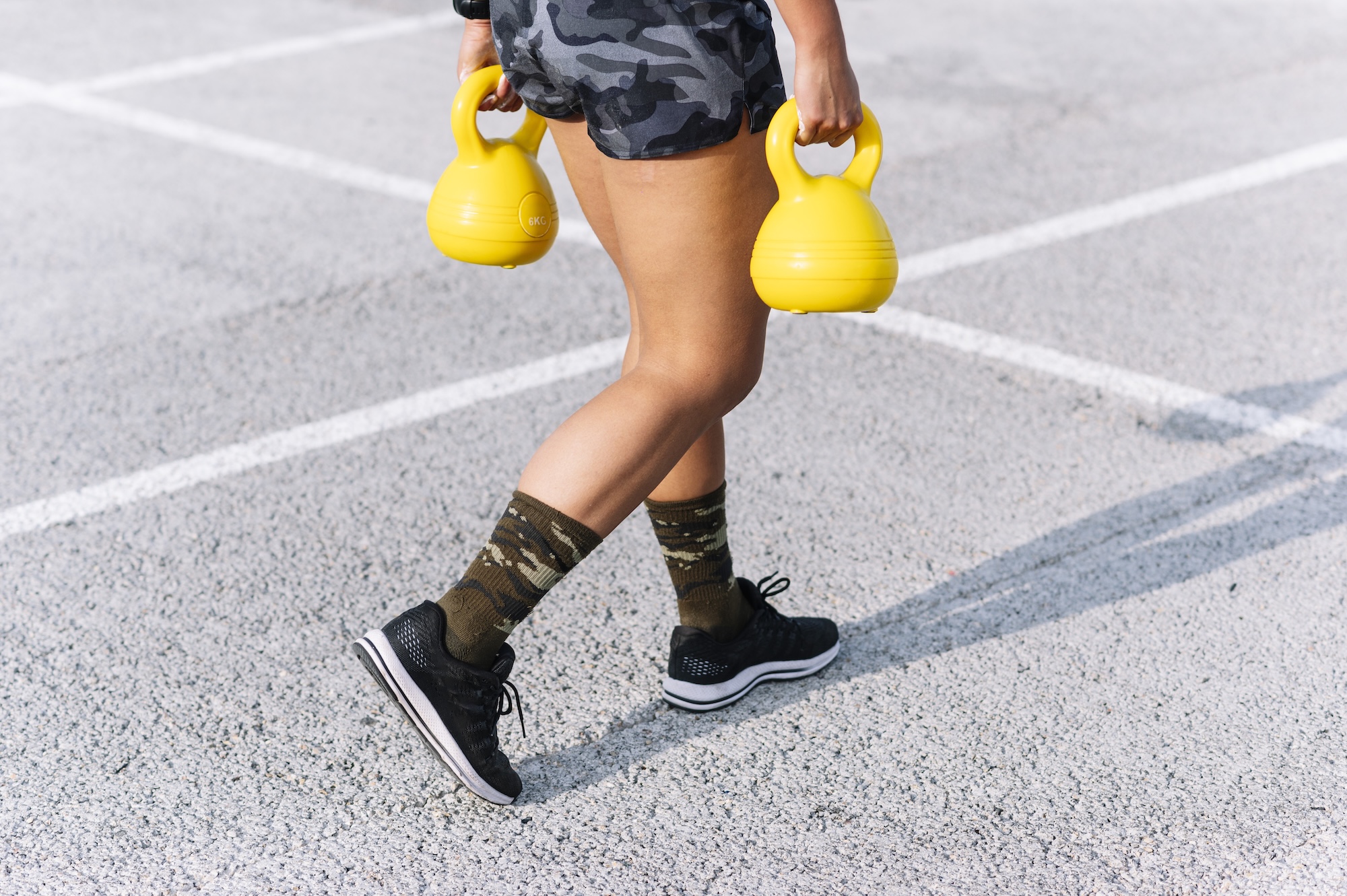 2510_CBHS_Blog_Images_Building_a_Home_Gym_4 lady_carrying_dumbells