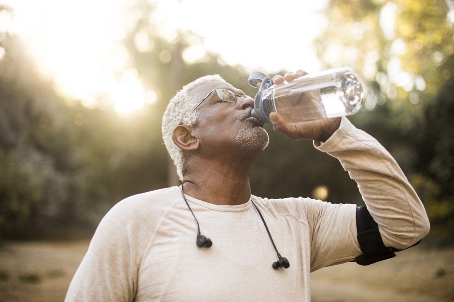 Man drinking a bottle of water