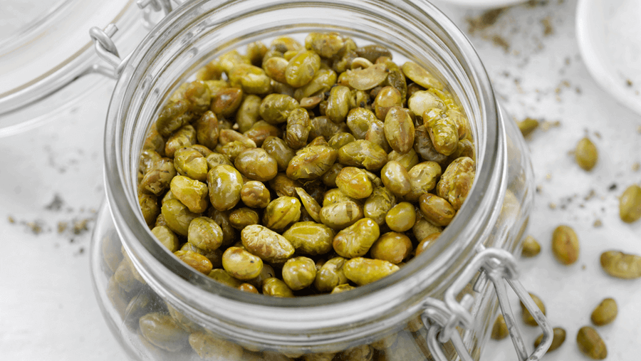 Crispy roasted edamame beans in a jar