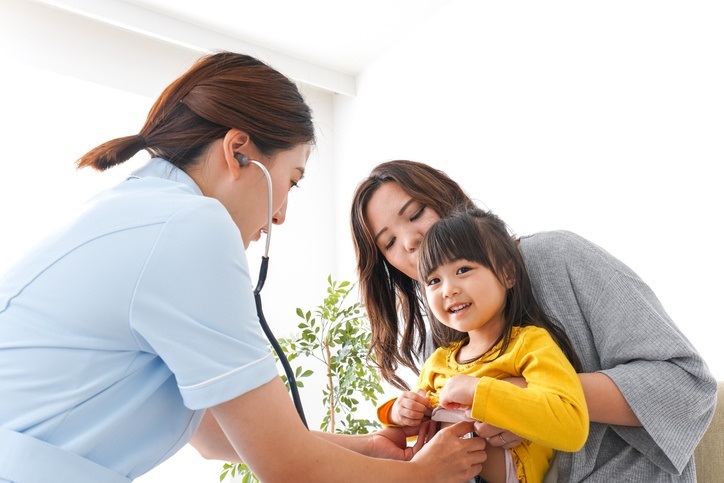 A mother with her kid at a GP